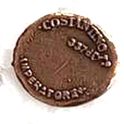 Modern replica of the portrait on a follis of Constantine as Caesar, with a modern side, the modern side: A modern inscription in Italian, COSTANTINO · 337 d.C. · IMPERATORE: it copies no ancient coin. Indicative photo of the replica on sale in the shop, bronze-coloured.