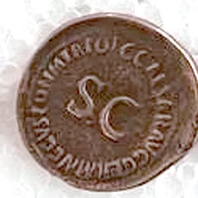 Modern replica of a dupondius of Caligula (not a sestertius), s c and the titles: A large S C in the centre; GERMANICVS and PON M TR POT can be read around it. Indicative photo of the replica on sale in the shop, bronze-coloured.