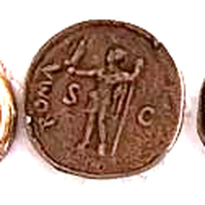 Modern replica of a sestertius of Vespasian, the goddess roma: Roma in a helmet, standing, with a spear and a small Victory on her hand; ROMA on the left, S and C on either side. Indicative photo of the replica on sale in the shop, bronze-coloured.