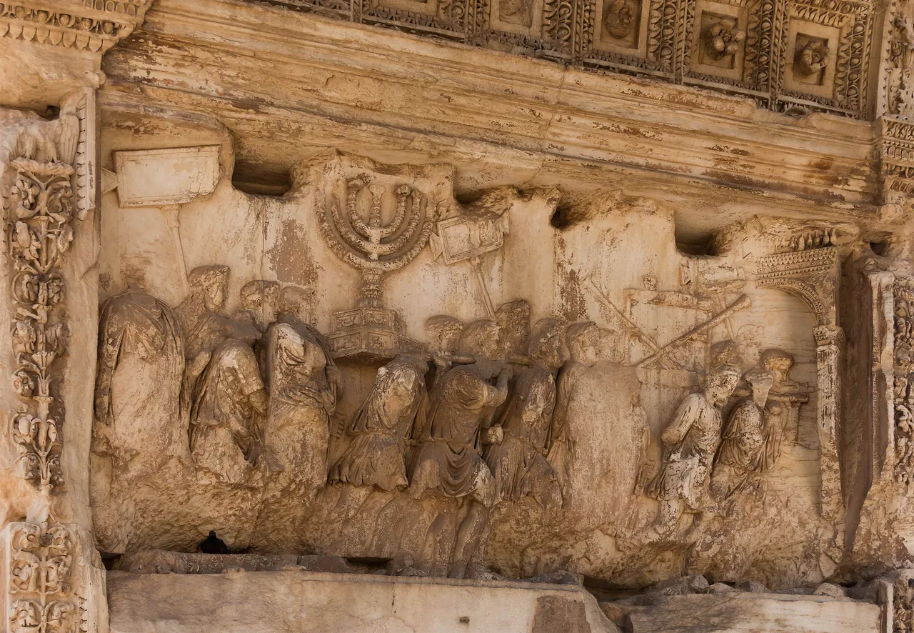 The relief inside the Arch of Titus: the procession with the seven-branched lampstand.